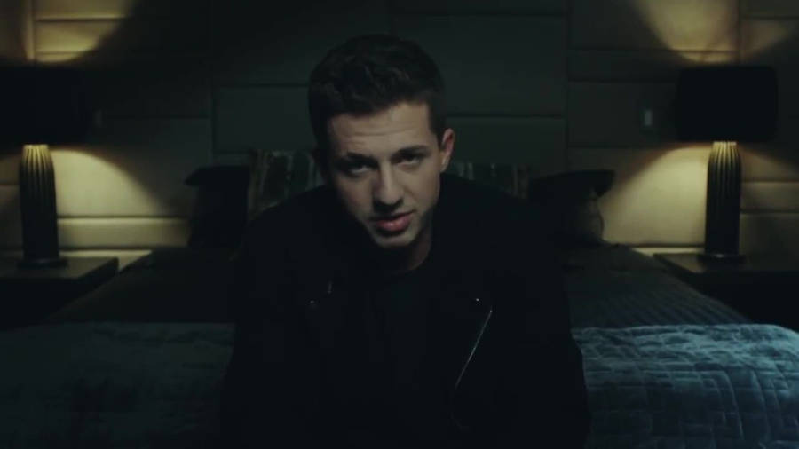 Charlie Puth In Dark Room Wallpaper