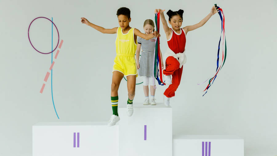 Cheerful Children On Olympic Sports Wallpaper