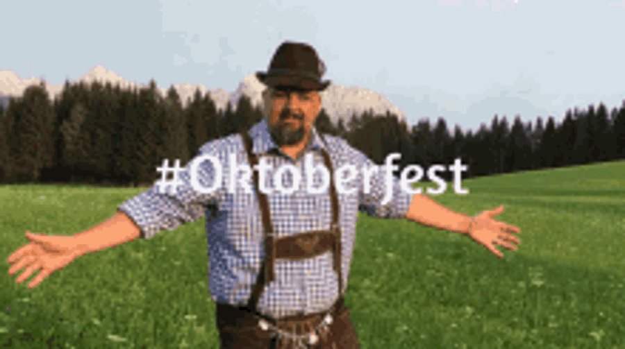 Cheerful Friends Celebrating Oktoberfest Wallpaper