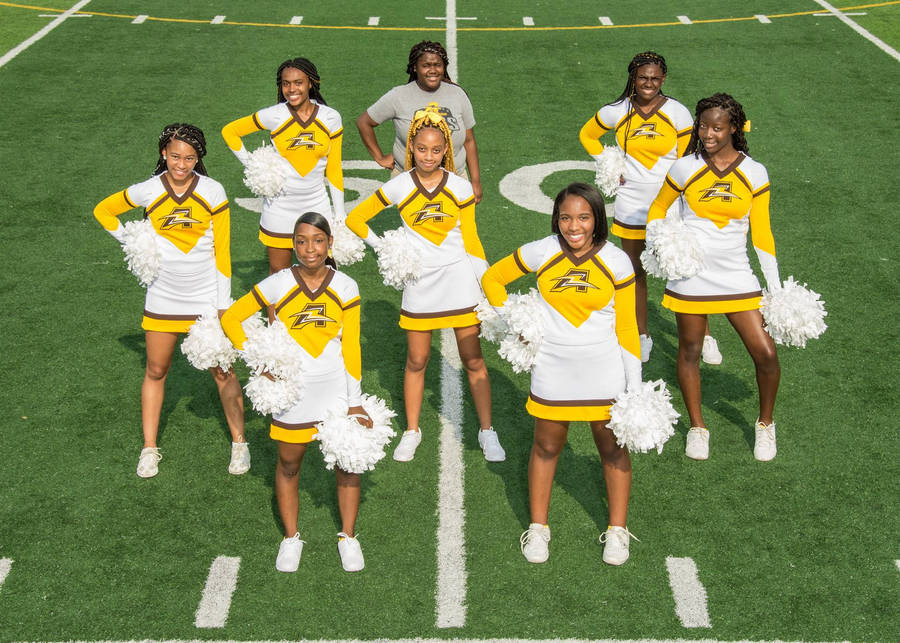 Cheerleading In Yellow Wallpaper