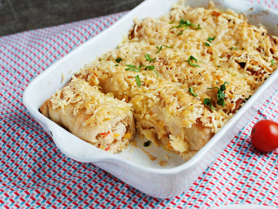 Cheesy Enchiladas On Baking Tray Wallpaper