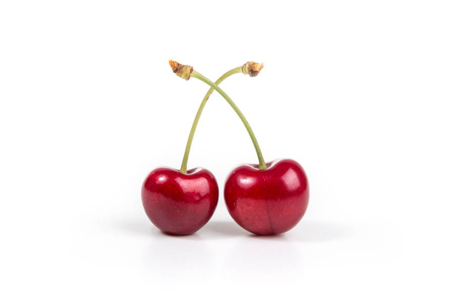 Cherry Fruit With Green Stem Wallpaper