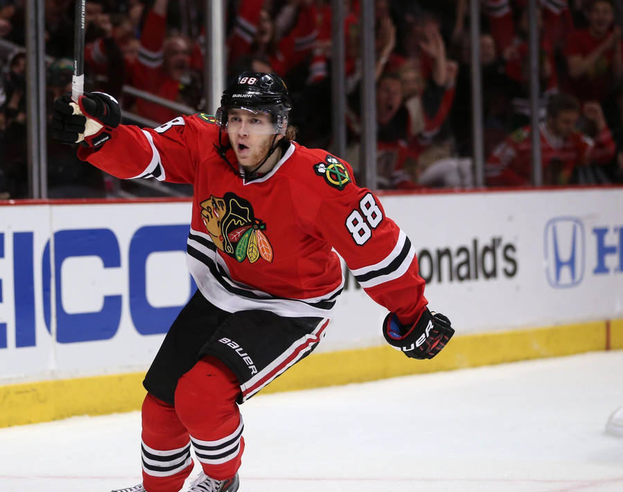 Chicago Blackhawks Star, Patrick Kane, Celebrates On Ice Wallpaper