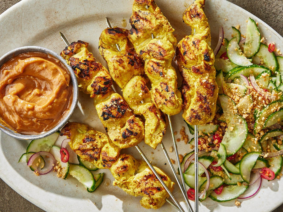 Chicken Satay With Peanut Sauce And Cucumber Salad Wallpaper