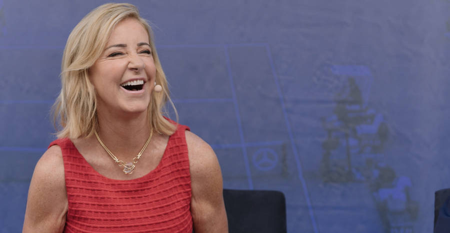 Chris Evert Laughing In Red Dress Wallpaper