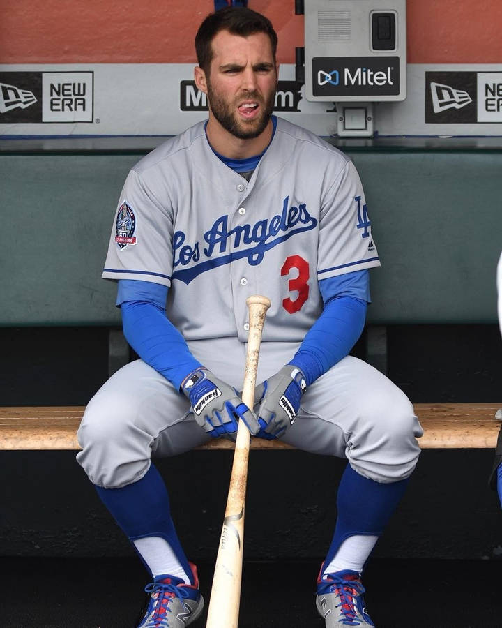 Chris Taylor Sitting On Bench Wallpaper