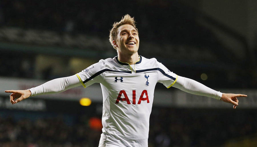 Christian Eriksen With His Arms Extended Out Wallpaper