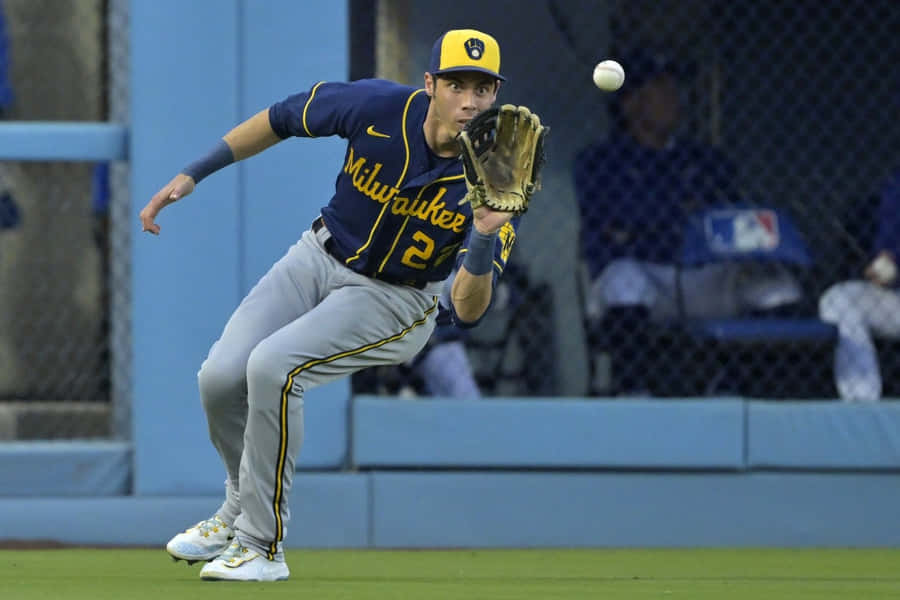 Christian Yelich Milwaukee Brewers Fielding Action Wallpaper