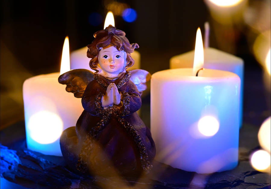 Christmas Angel And White Candles Wallpaper