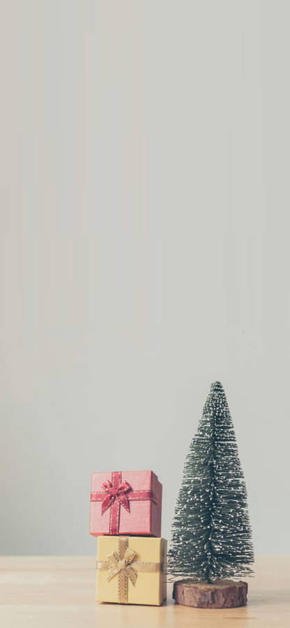 Christmas Pine Tree And Gifts Iphone Wallpaper