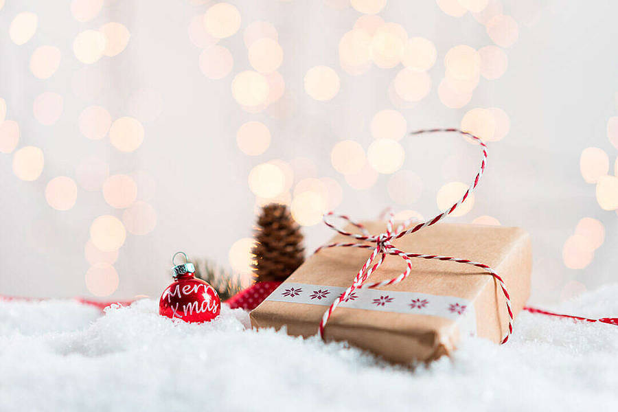 Christmas Present With Bokeh Backdrop Wallpaper