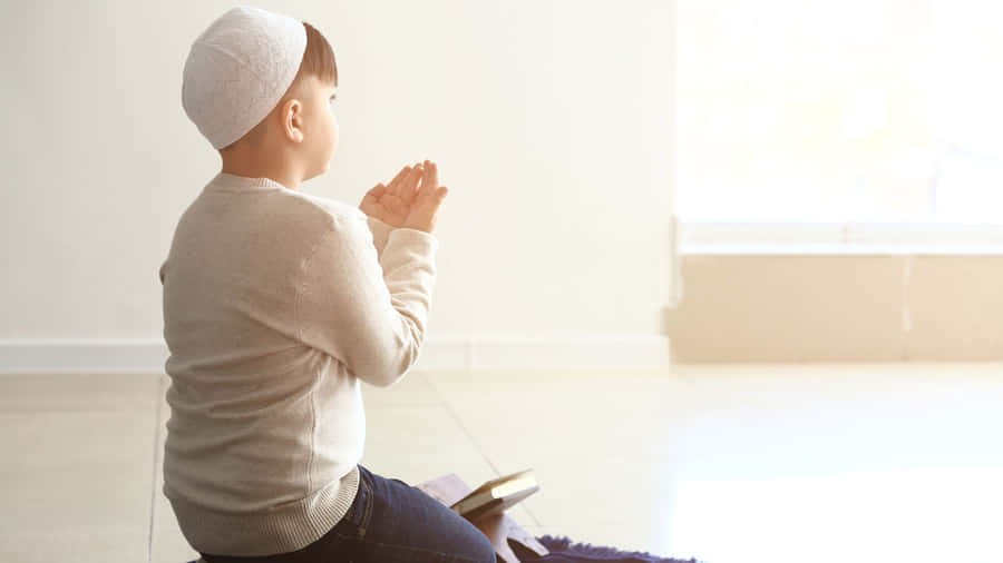 Chubby Muslim Boy Praying Wallpaper