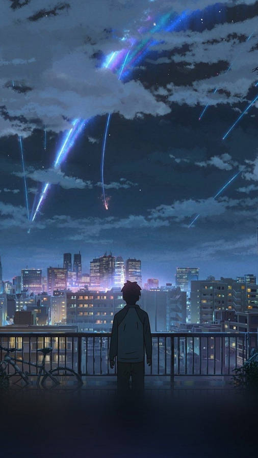 City Lights Illuminating The Night Sky Wallpaper