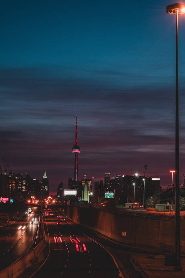 City Tower With Neon Lights Wallpaper