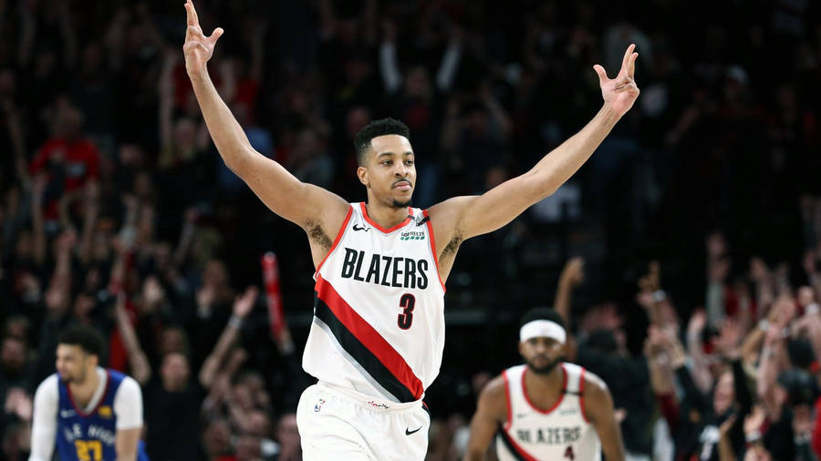 Cj Mccollum Raising Arms Wallpaper