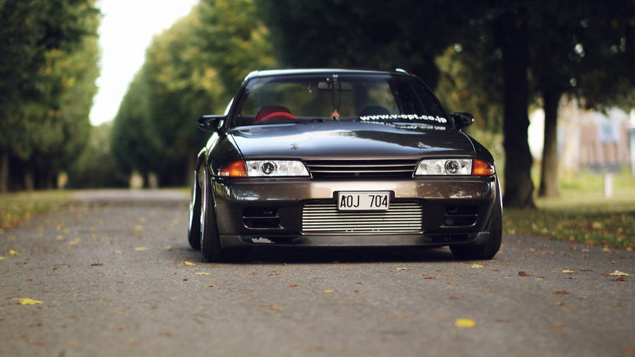 Classic Beauty: Vintage Black Skyline Car Wallpaper