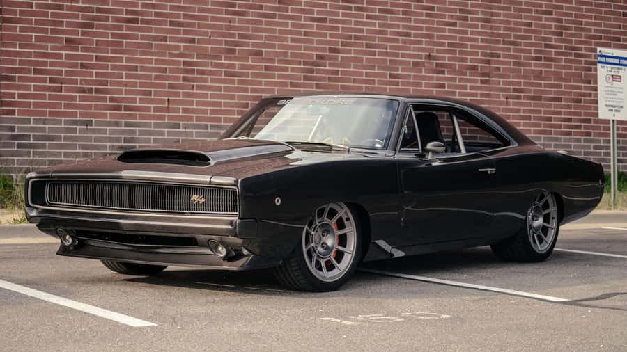 Classic_ Black_ Muscle_ Car_ Parked Wallpaper