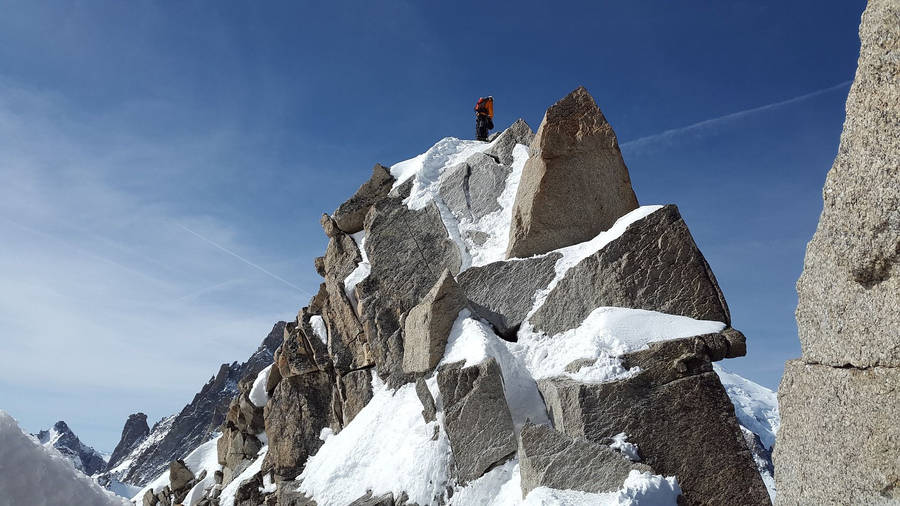 Climbing An Intricate Mountain Wallpaper