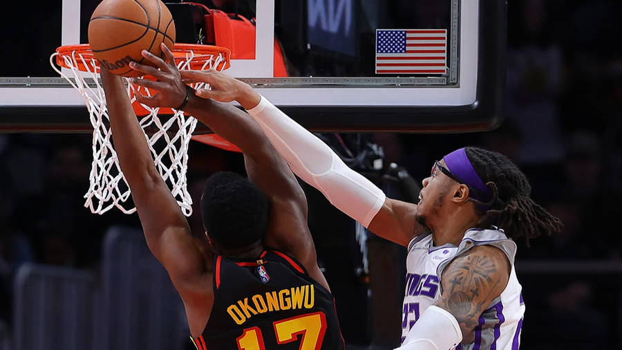 Clint Capela Attempts To Impede Opponent Wallpaper