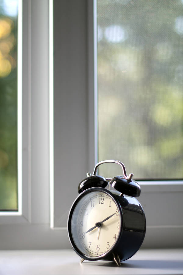 Clock By The Window Wallpaper