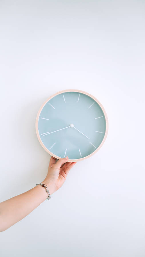 Clock In Pastel Blue Wallpaper