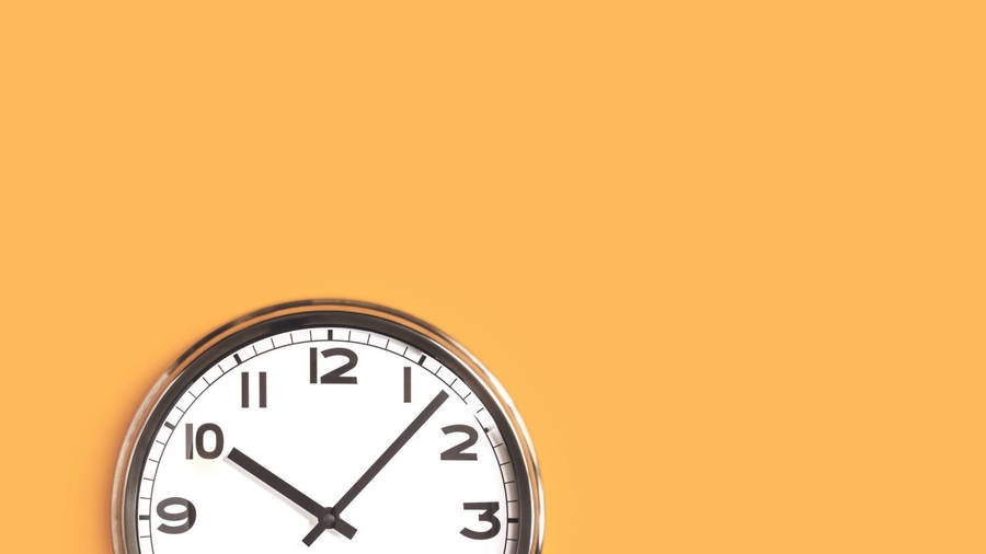 Clock On Orange Background Wallpaper