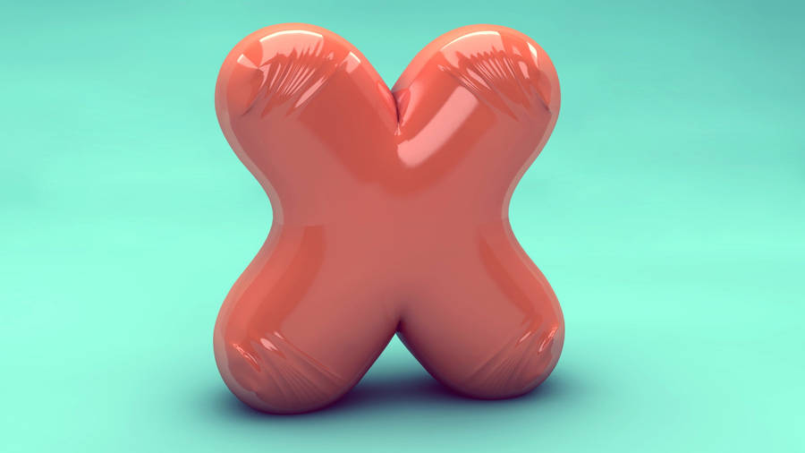 Close-up Of A Balloon Shaped As Letter X Wallpaper