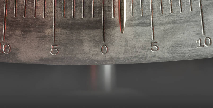 Close-up Shot Of An Iron Measuring Tool Wallpaper