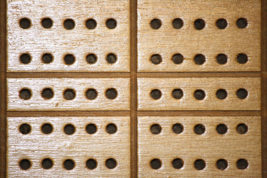 Close Up Wooden Cribbage Holes Wallpaper