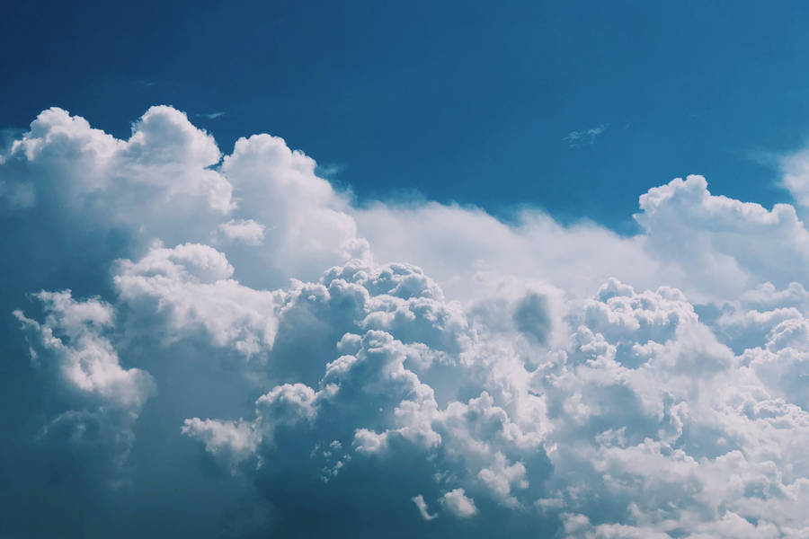 Clouds In A Beautiful Blue Sky Wallpaper