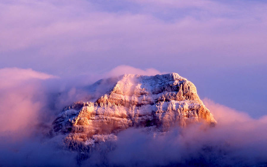 Cloudy Mountain Top Macos Wallpaper