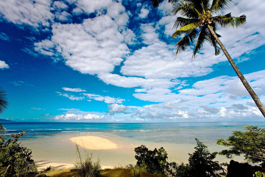 Cloudy Skies Beach In Comoros Wallpaper