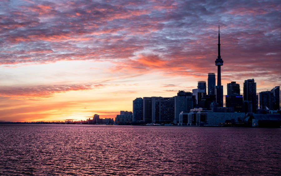 Cn Tower Silhouette With Stunning Sunset Wallpaper