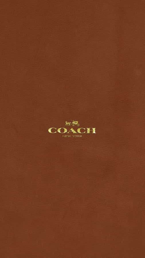 Coach Logo On A Brown Background Wallpaper