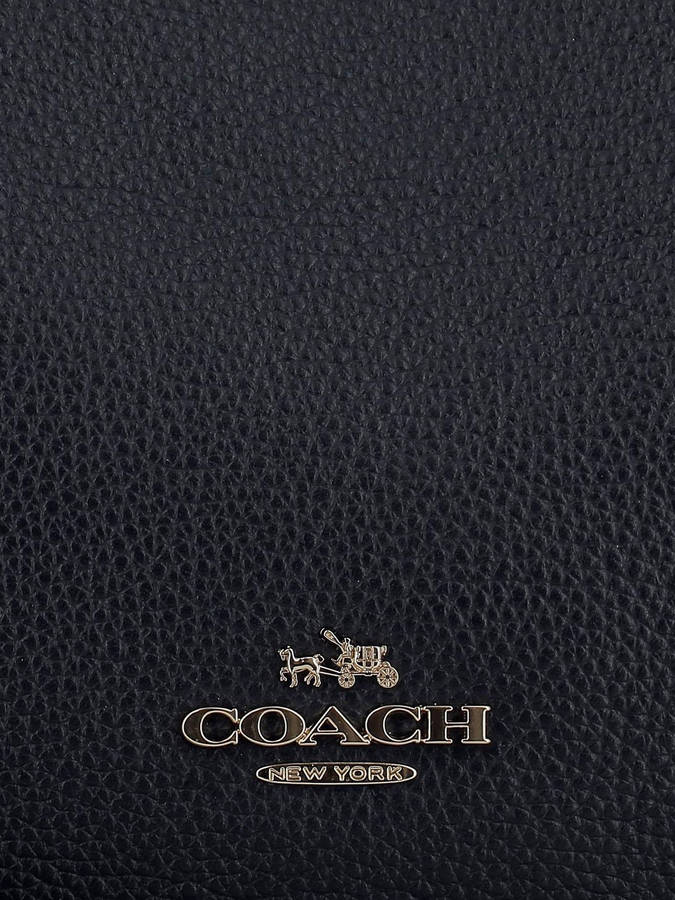 Coach Logo On Black Leather Wallpaper