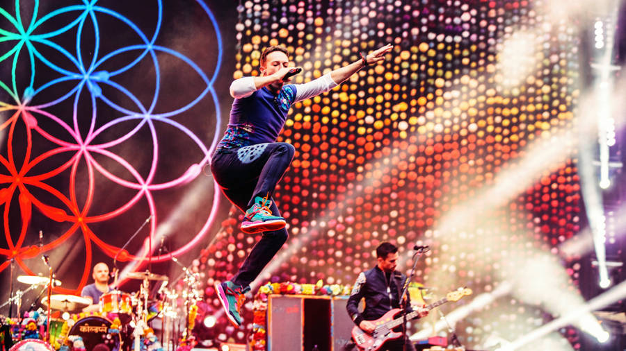 Coldplay Concert Chris Martin Jumping Wallpaper