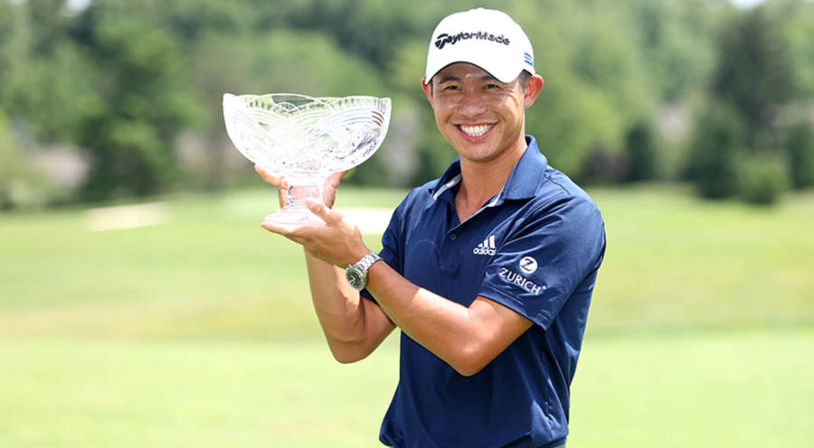 Collin Morikawa Holding A Glass Trophy Wallpaper