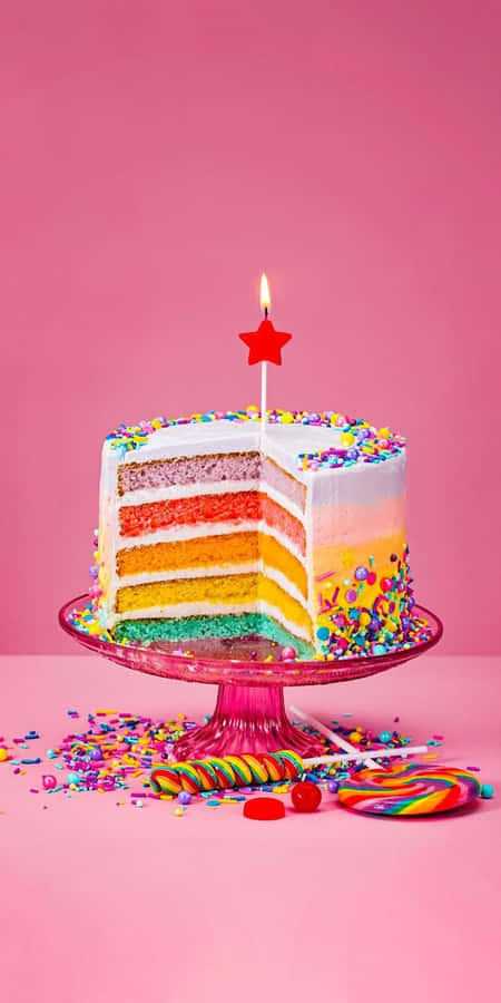 Colorful Birthday Cakewith Candle Wallpaper