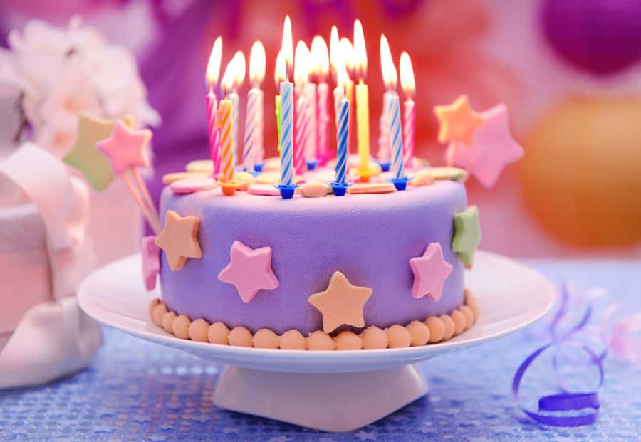 Colorful Birthday Cakewith Candles Wallpaper