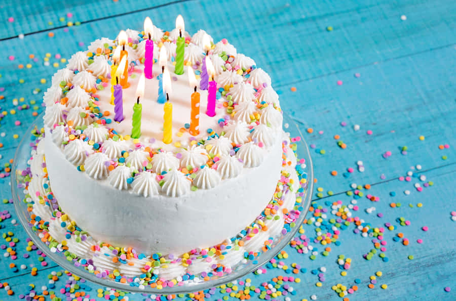 Colorful Birthday Cakewith Candles Wallpaper