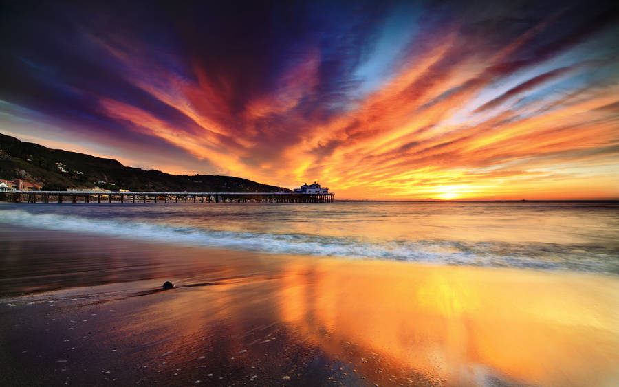 Colorful Clouds Over Malibu Beach Wallpaper