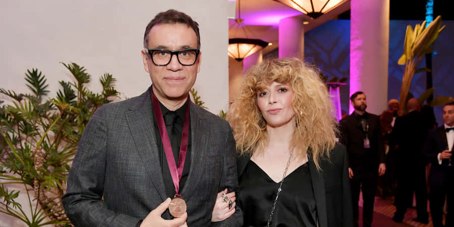 Comedian Fred Armisen Engaging The Audience With A Passionate Performance. Wallpaper