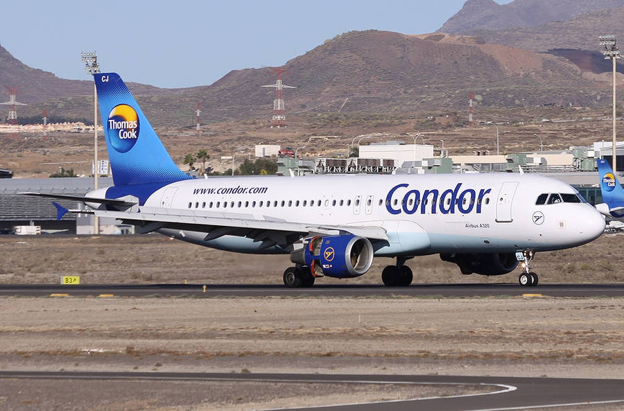 Condor Airlines Airplane On Rural Airport Wallpaper