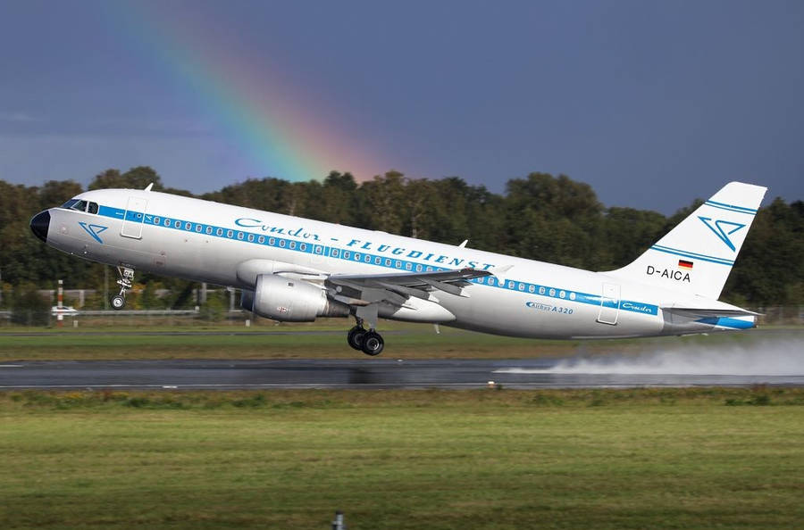 Condor Airlines Plane Take Off With Rainbow Wallpaper