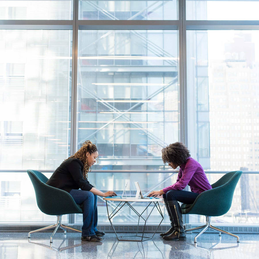 Consultant Comforting A Client Wallpaper