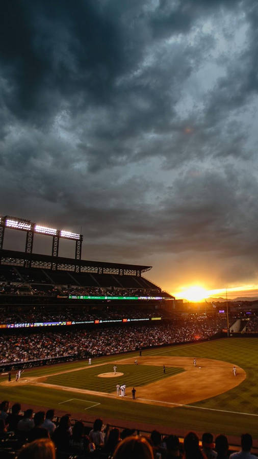 Cool Baseball Game In Sunset Wallpaper