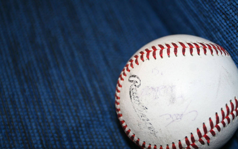 Cool Baseball On Blue Carpet Wallpaper