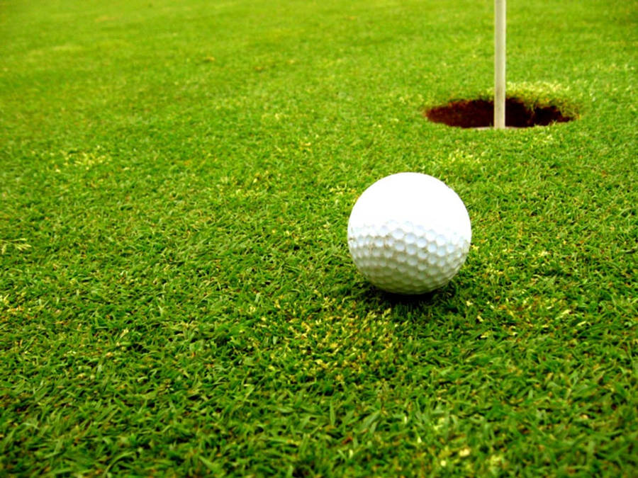 Cool Golf Ball Near A Goal Wallpaper