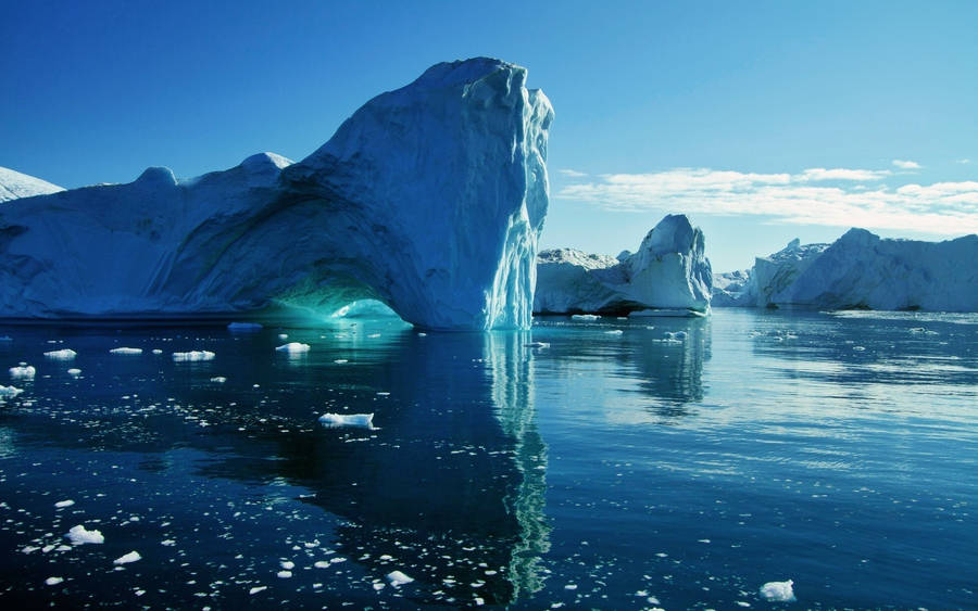 Cool Hd Blue-toned Icebergs Wallpaper