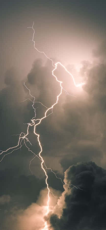 Cool Lightning Striking Through Dark Clouds Wallpaper